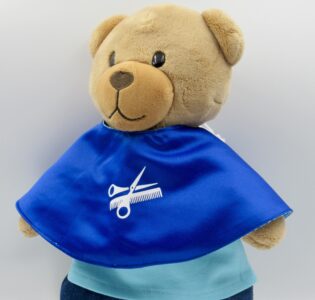 De foto van het product Kapmantel voor beer Kiki