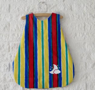 De foto van het product Gestreepte slaapzak voor Puk