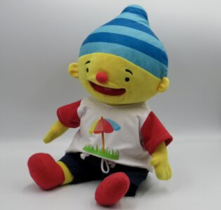 De foto van het product Kledingset "Parasol", past op handpop Puk