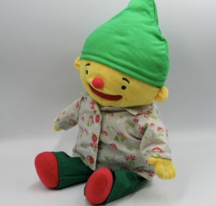 De foto van het product Kledingset "Herfst" voor handpop Puk