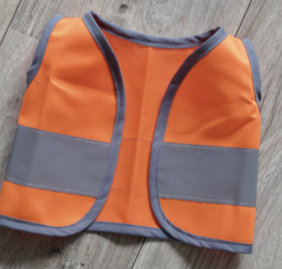 De foto van het product Veiligheidshesje, past op handpop Bobbi