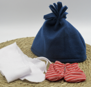 De foto van het product Muts, sjaal en wanten voor Puk