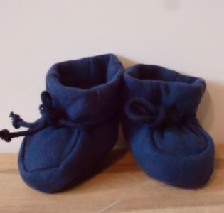 De foto van het product Sloffen voor beer Kiki