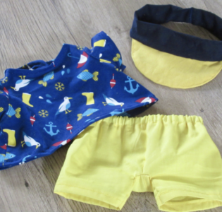 De foto van het product Strandkleding, past op handpop Bobbi